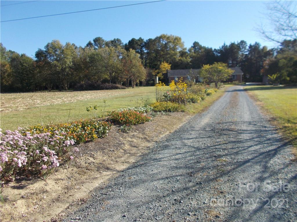 109 Brief Road West Fairview, NC 28079 - Photo 14 of 16 a view of a town with mountains in the background