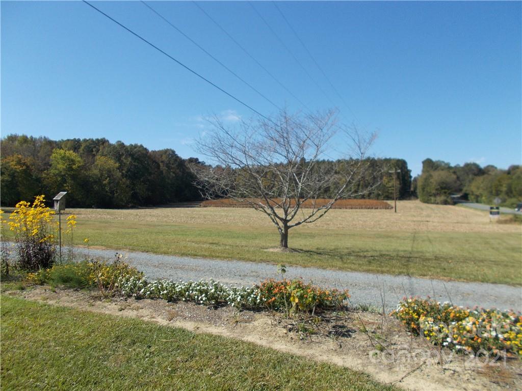 109 Brief Road West Fairview, NC 28079 - Photo 2 of 16 a view of a yard with an outdoor space