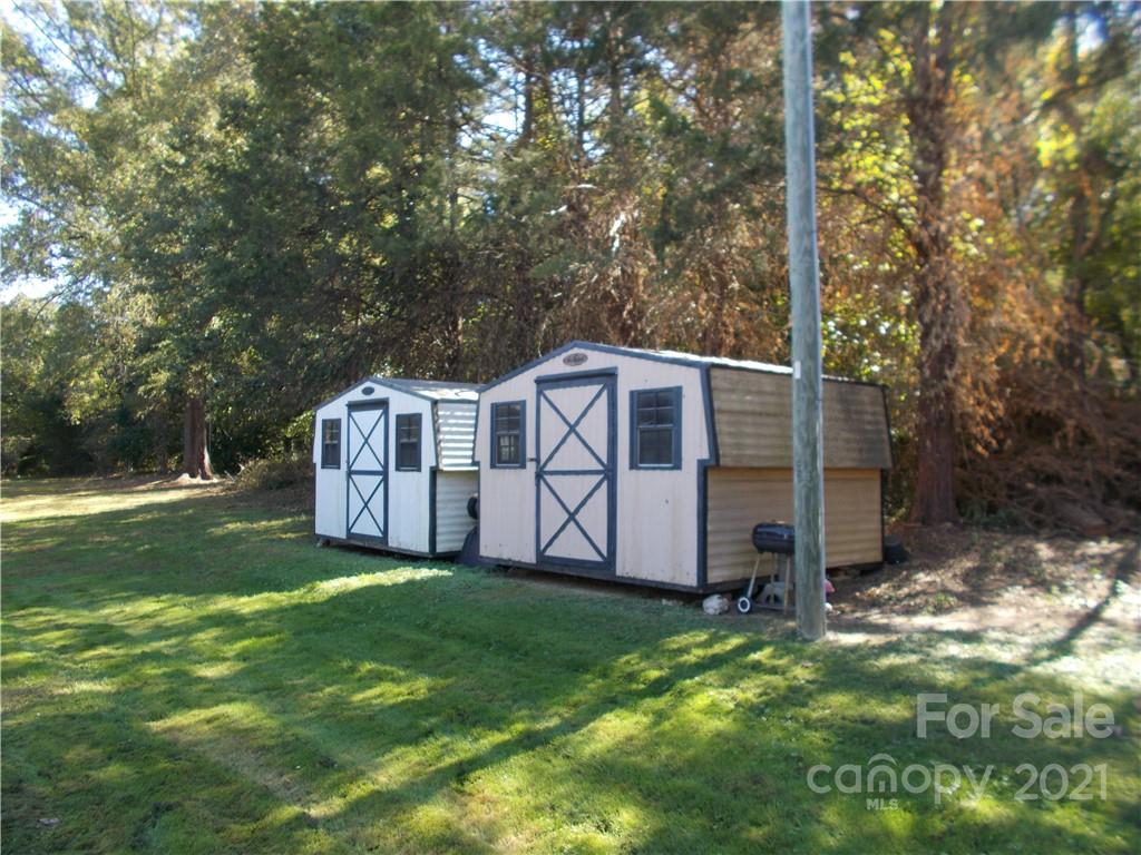 109 Brief Road West Fairview, NC 28079 - Photo 9 of 16 a view of backyard with garden