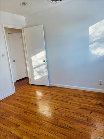 a dining room with a table and chairs
