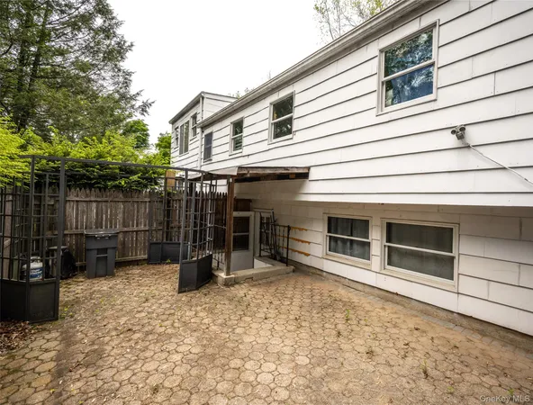 a bathroom with a sink toilet and a mirror