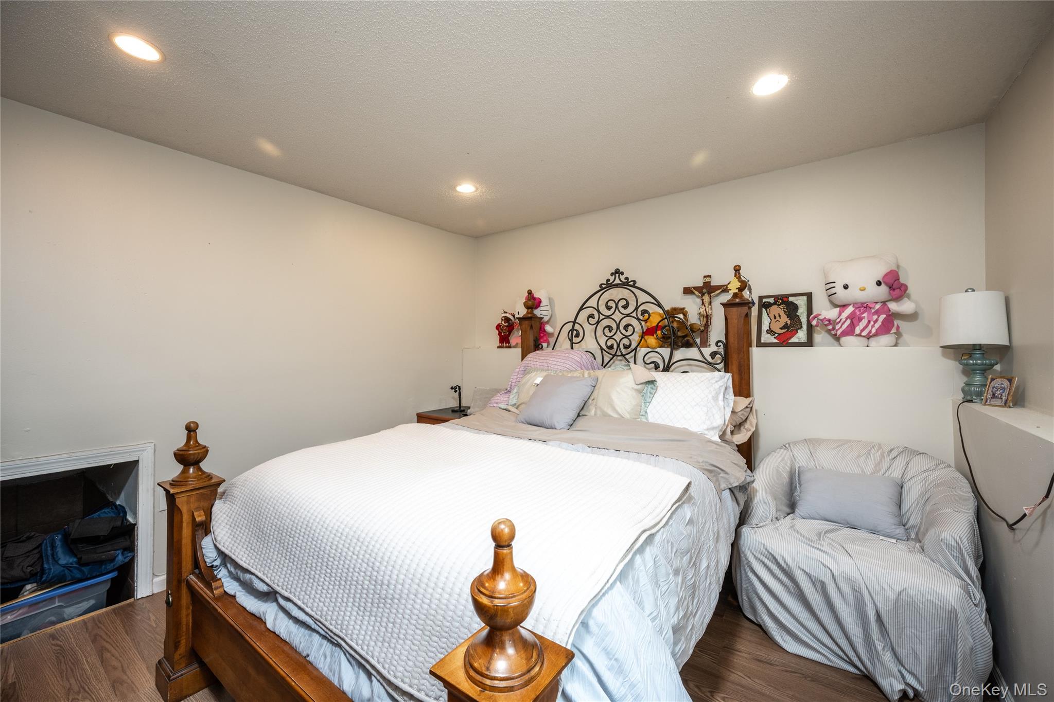 929 Fox Meadow Road Yorktown Heights, NY 10598 - Photo 21 of 32 a bed room with a bed and a chair