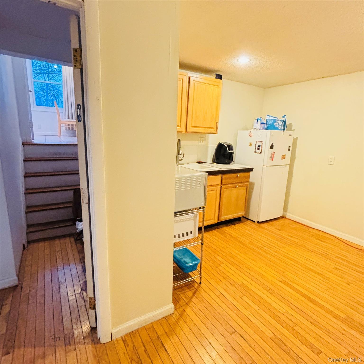 929 Fox Meadow Road Yorktown Heights, NY 10598 - Photo 26 of 41 Interior access to the finished basement is from the hall shown on the left - And to the left of the hall is the laundry room shown in the next photo.