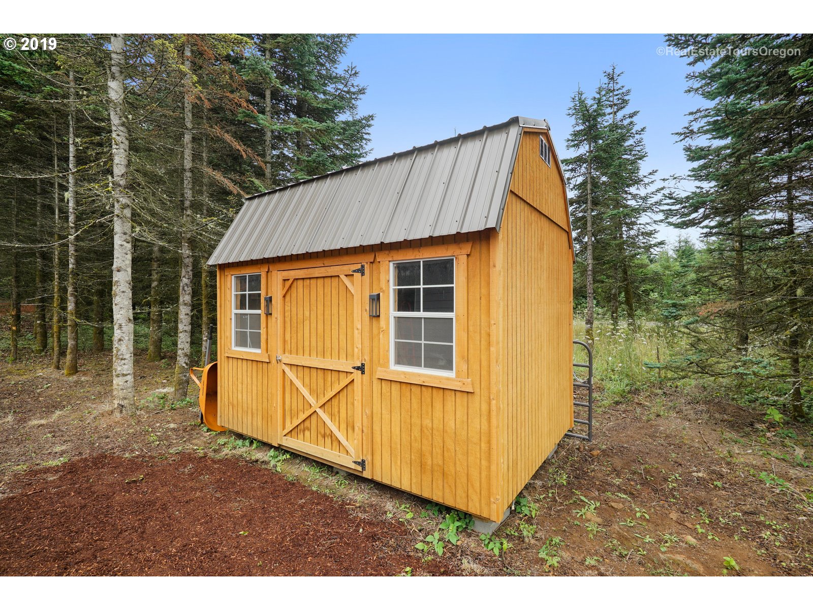 11909 Southeast Laughing Water Road Sandy, OR 97055 - Photo 17 of 22 a view of outdoor space and front view of a house