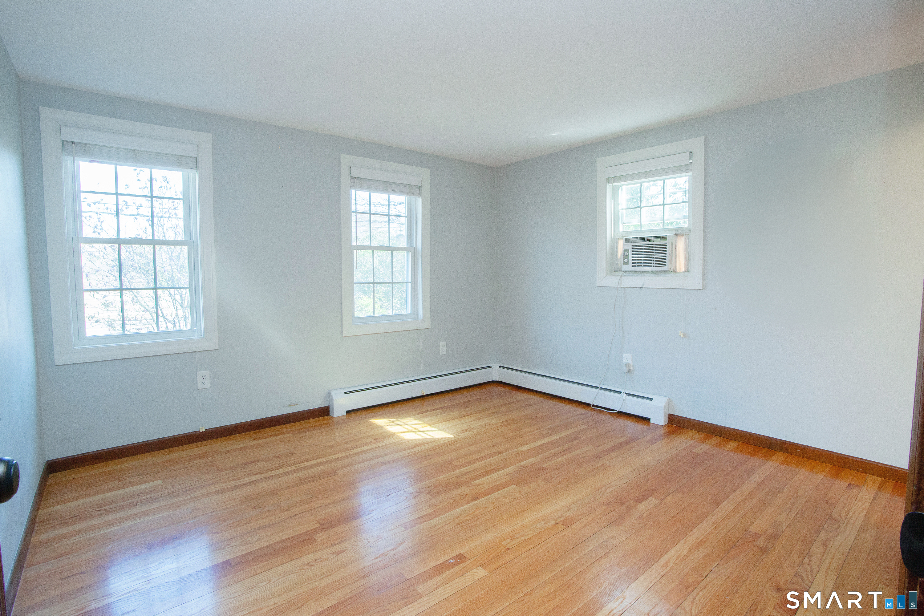 172 Weymouth Road Enfield, CT 06082 - Photo 17 of 35 Gleaming hardwood floors in this first floor bedroom
