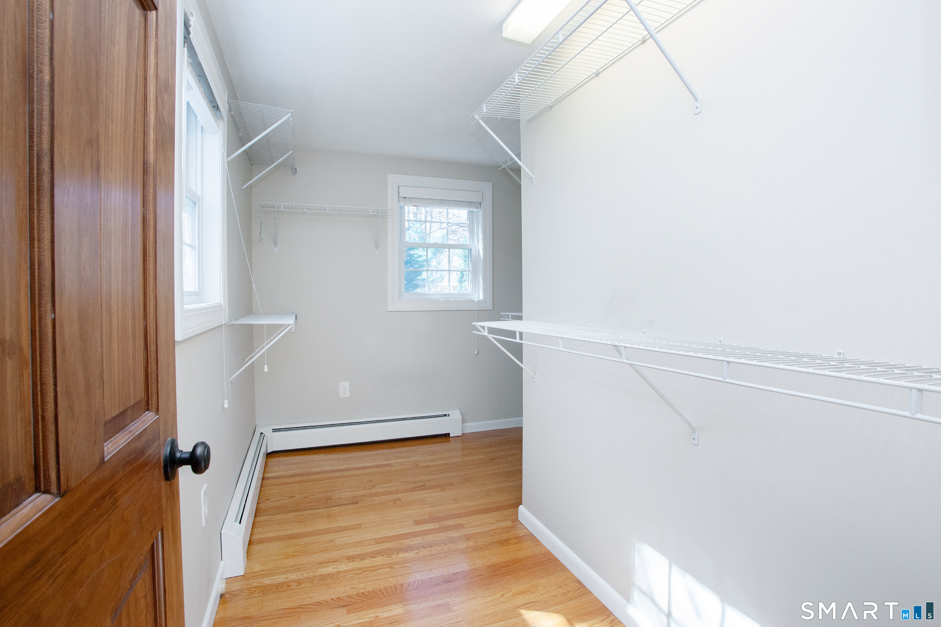 172 Weymouth Road Enfield, CT 06082 - Photo 21 of 35 Spacious closet for primary bedroom suite