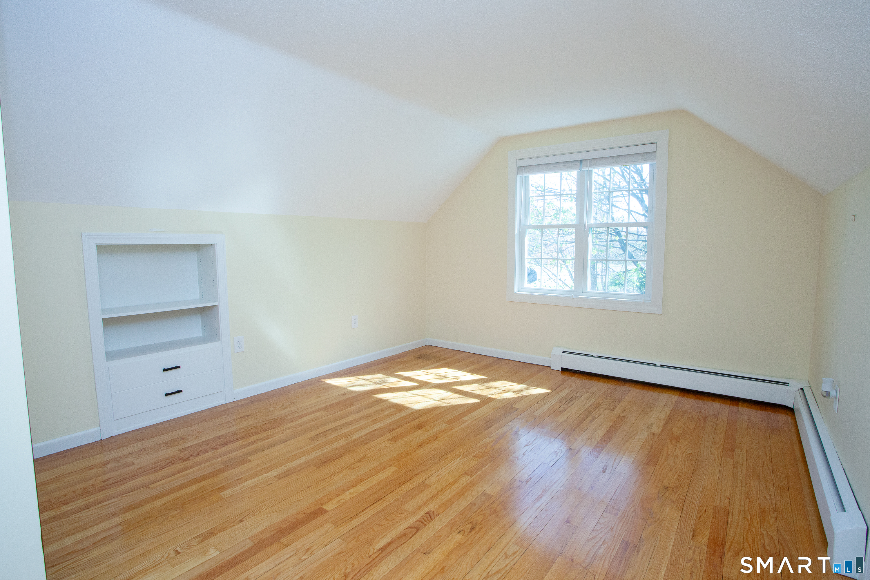 172 Weymouth Road Enfield, CT 06082 - Photo 25 of 35 Large upper bedroom with built in and hardwood floor