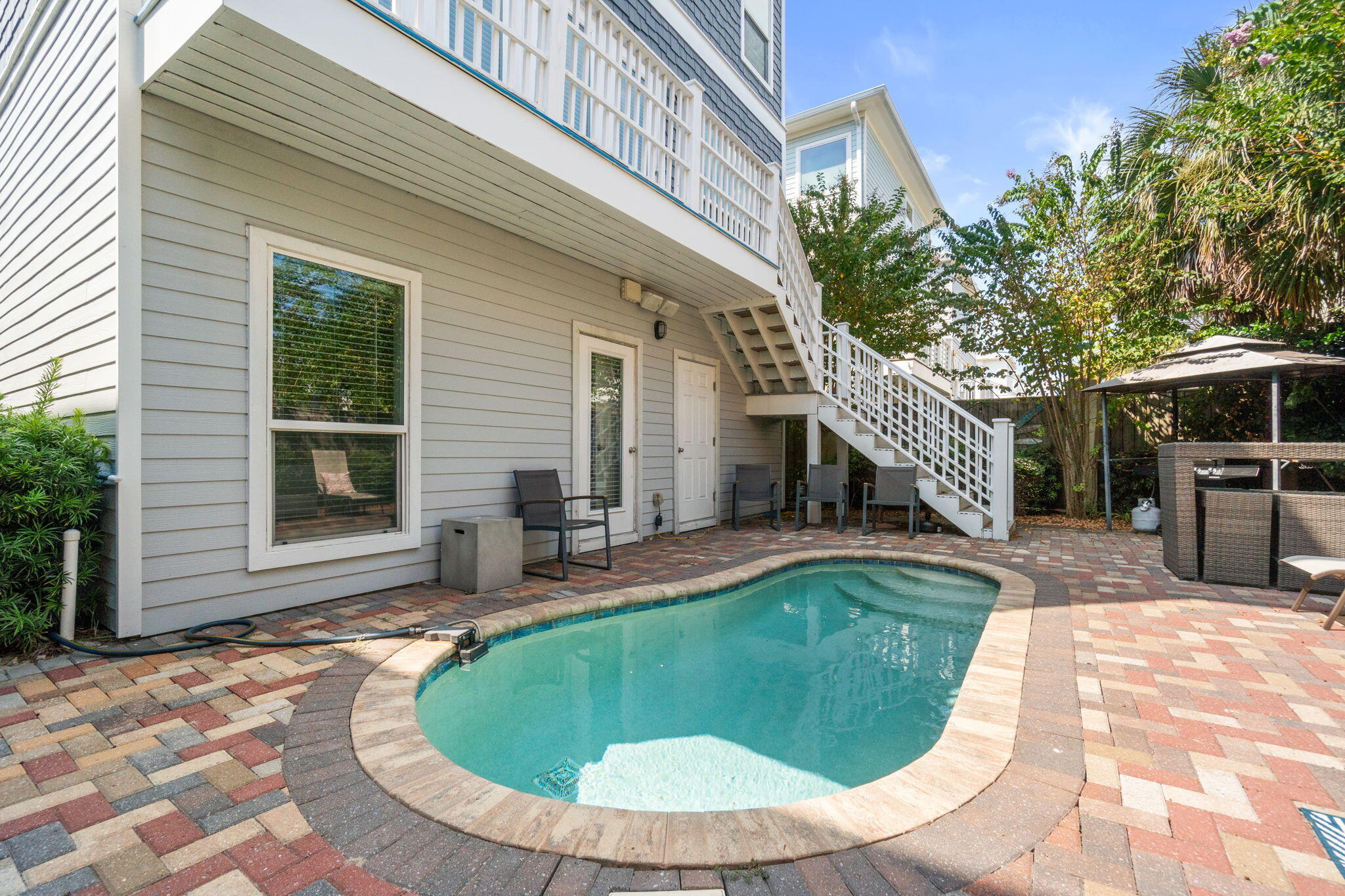 29 Payne Street Miramar Beach, FL 32550 - Photo 18 of 76 a view of a house with swimming pool and sitting area