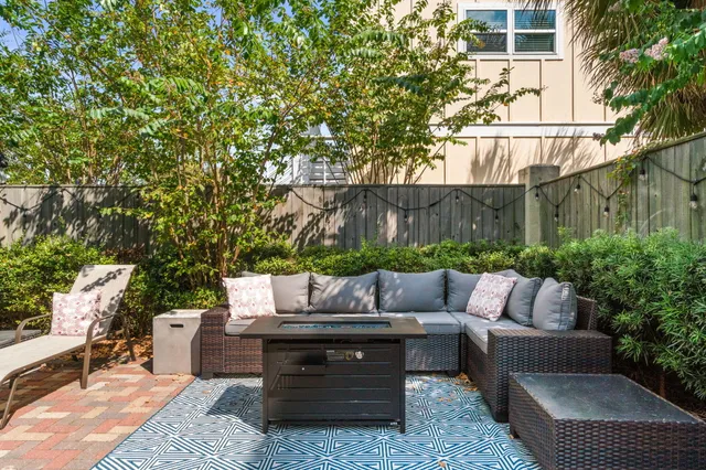 a bedroom with a bed and a mirror