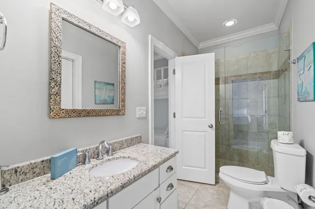 a bedroom with a large bed and a large window