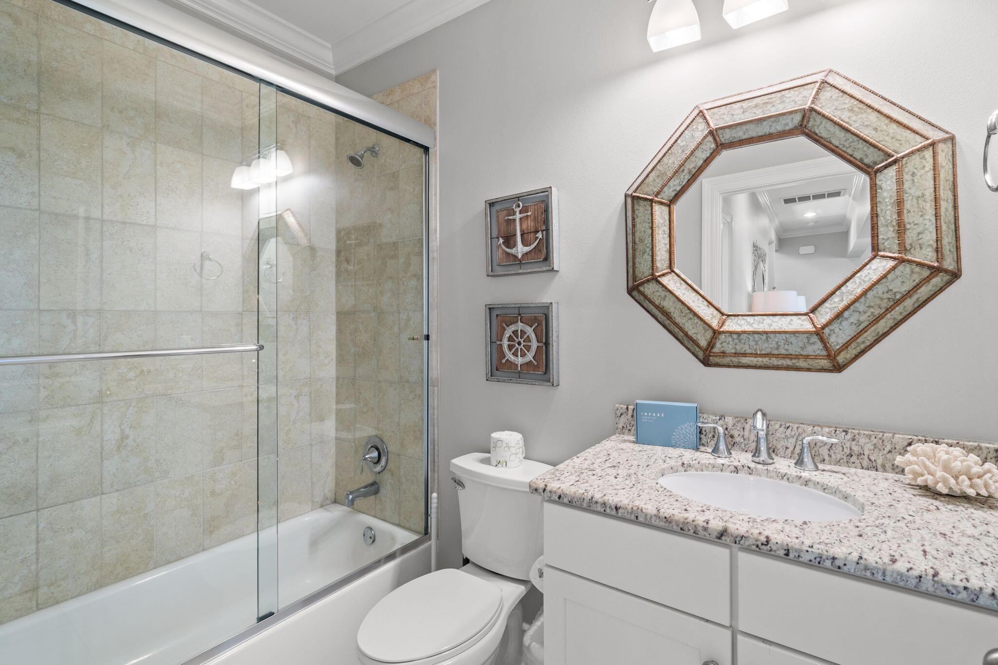 29 Payne Street Miramar Beach, FL 32550 - Photo 35 of 76 a bathroom with a granite countertop sink toilet and shower