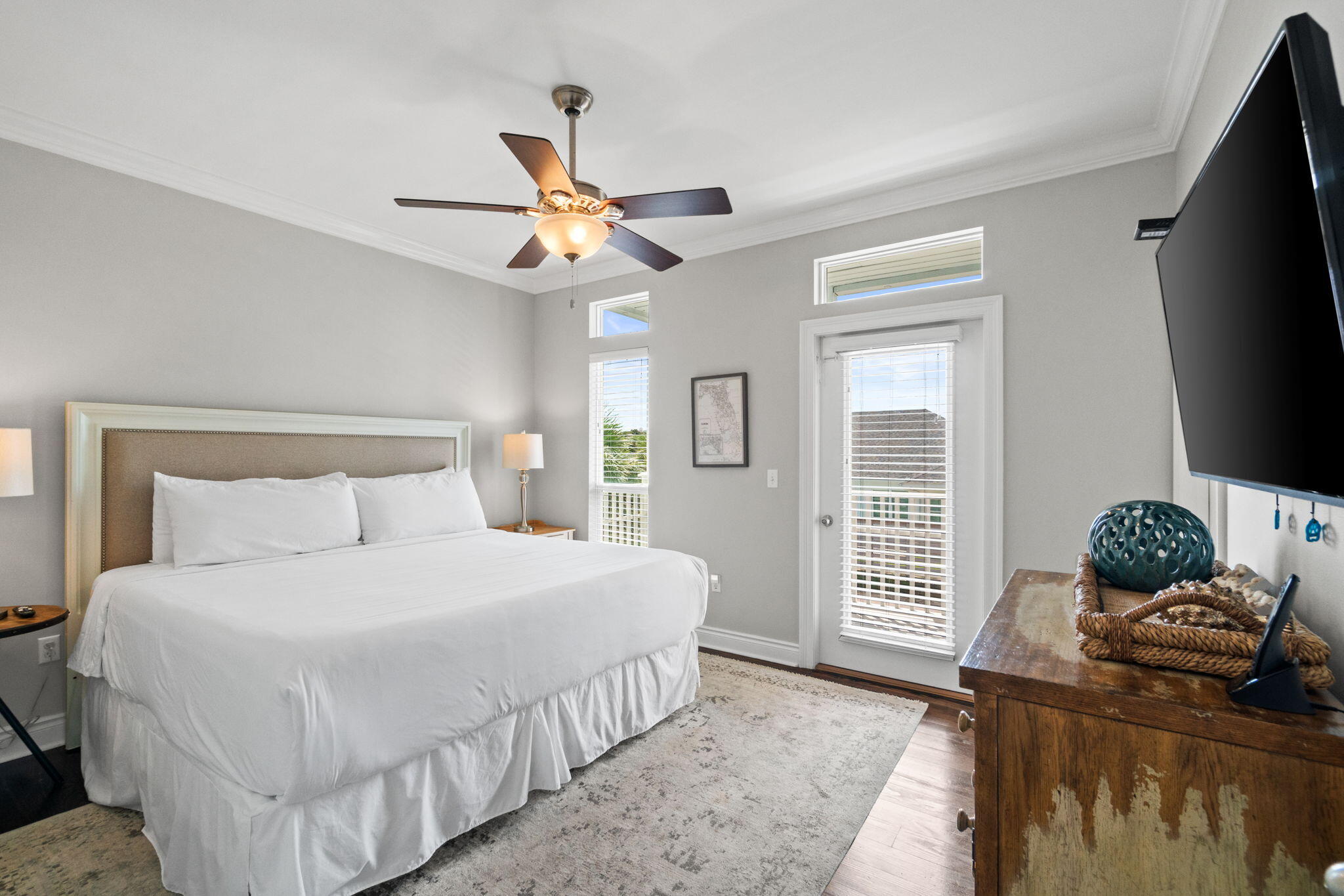 29 Payne Street Miramar Beach, FL 32550 - Photo 37 of 76 a bedroom with a bed and a flat screen tv