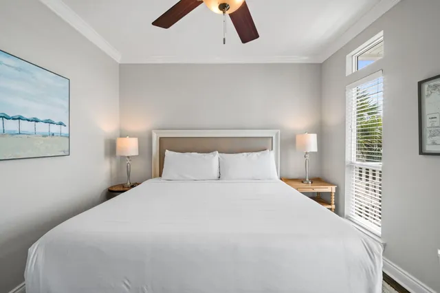 a bedroom with furniture and flat screen tv