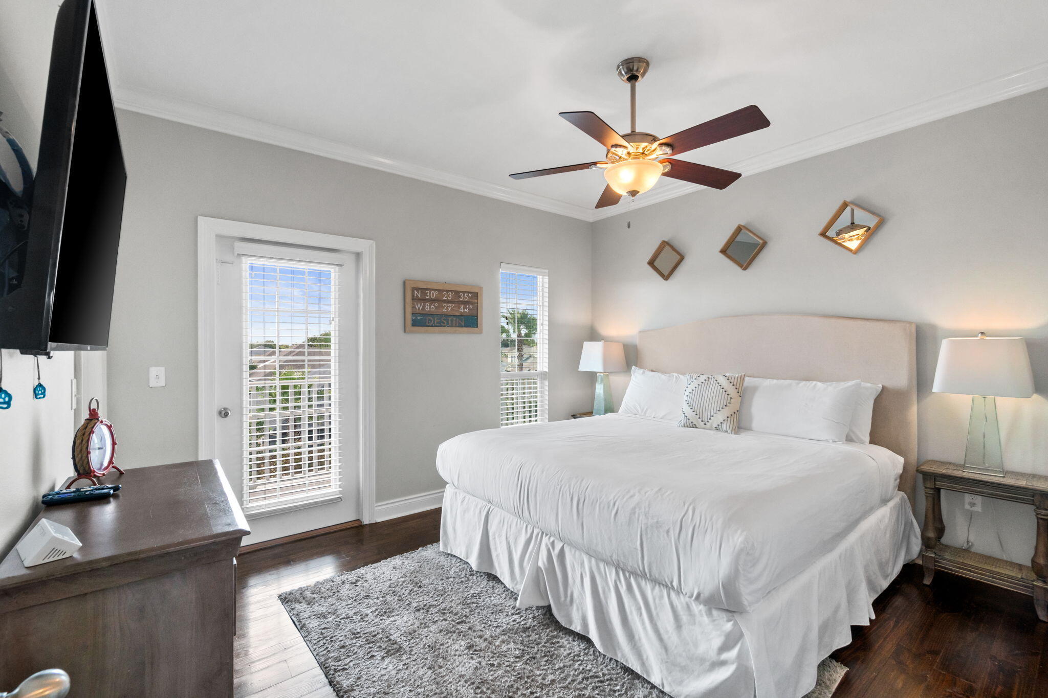 29 Payne Street Miramar Beach, FL 32550 - Photo 46 of 76 a bedroom with a bed and a flat screen tv