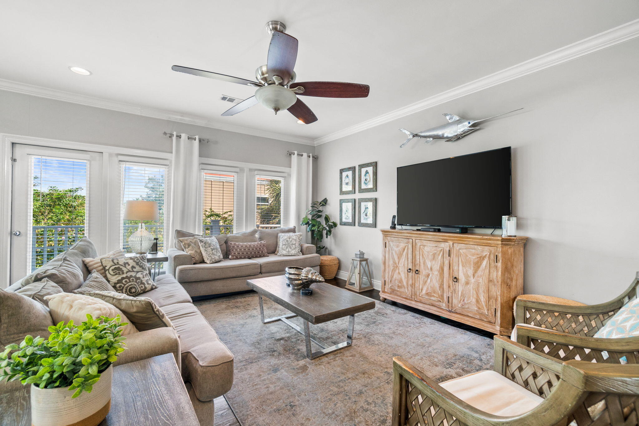 29 Payne Street Miramar Beach, FL 32550 - Photo 5 of 76 a living room with furniture and a flat screen tv