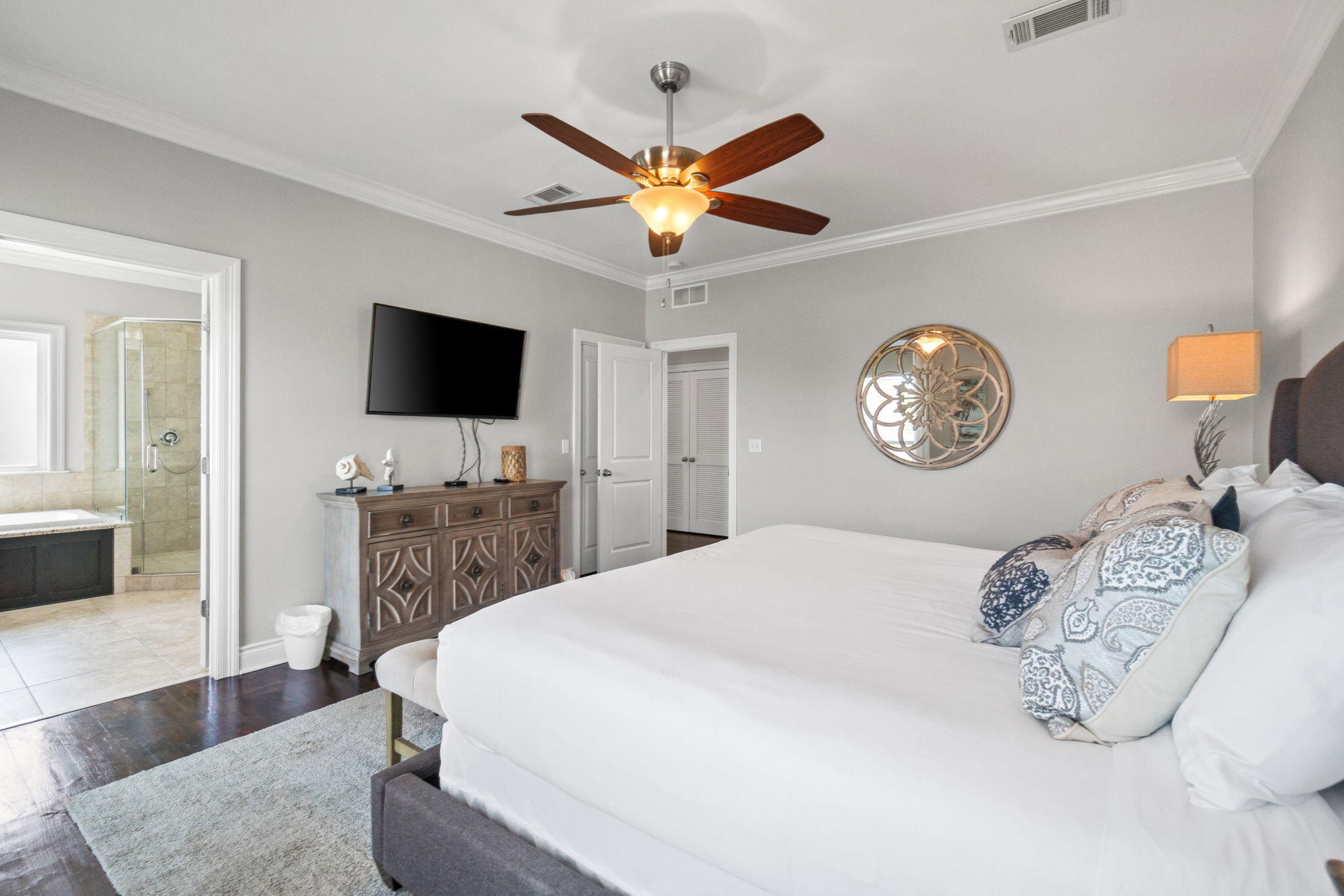 29 Payne Street Miramar Beach, FL 32550 - Photo 55 of 76 a bedroom with a bed and a flat screen tv