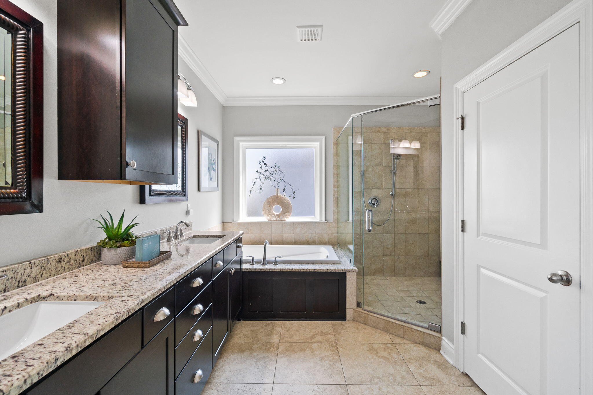 29 Payne Street Miramar Beach, FL 32550 - Photo 56 of 76 a spacious bathroom with a granite countertop sink mirror and shower