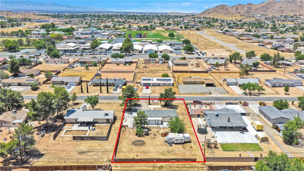 15471 Washoan Road Apple Valley, CA 92307 - Photo 37 of 38 an aerial view of residential houses with outdoor space