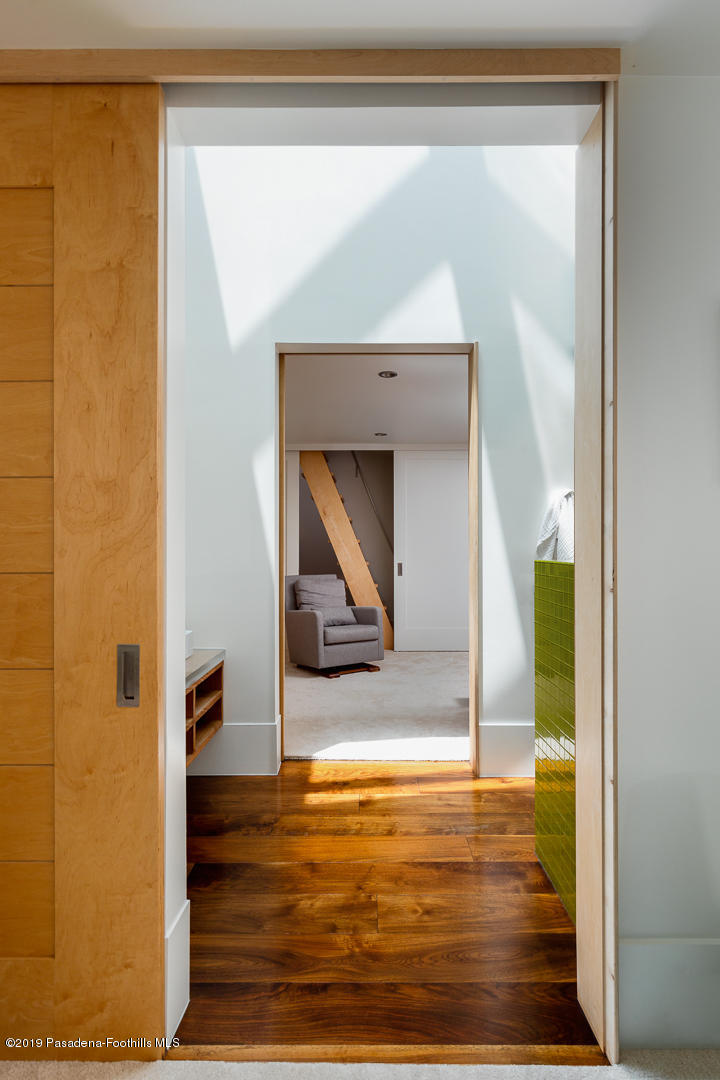 561 Woodland Road Pasadena, CA 91106 - Photo 23 of 41 a view of living room with a wooden floor