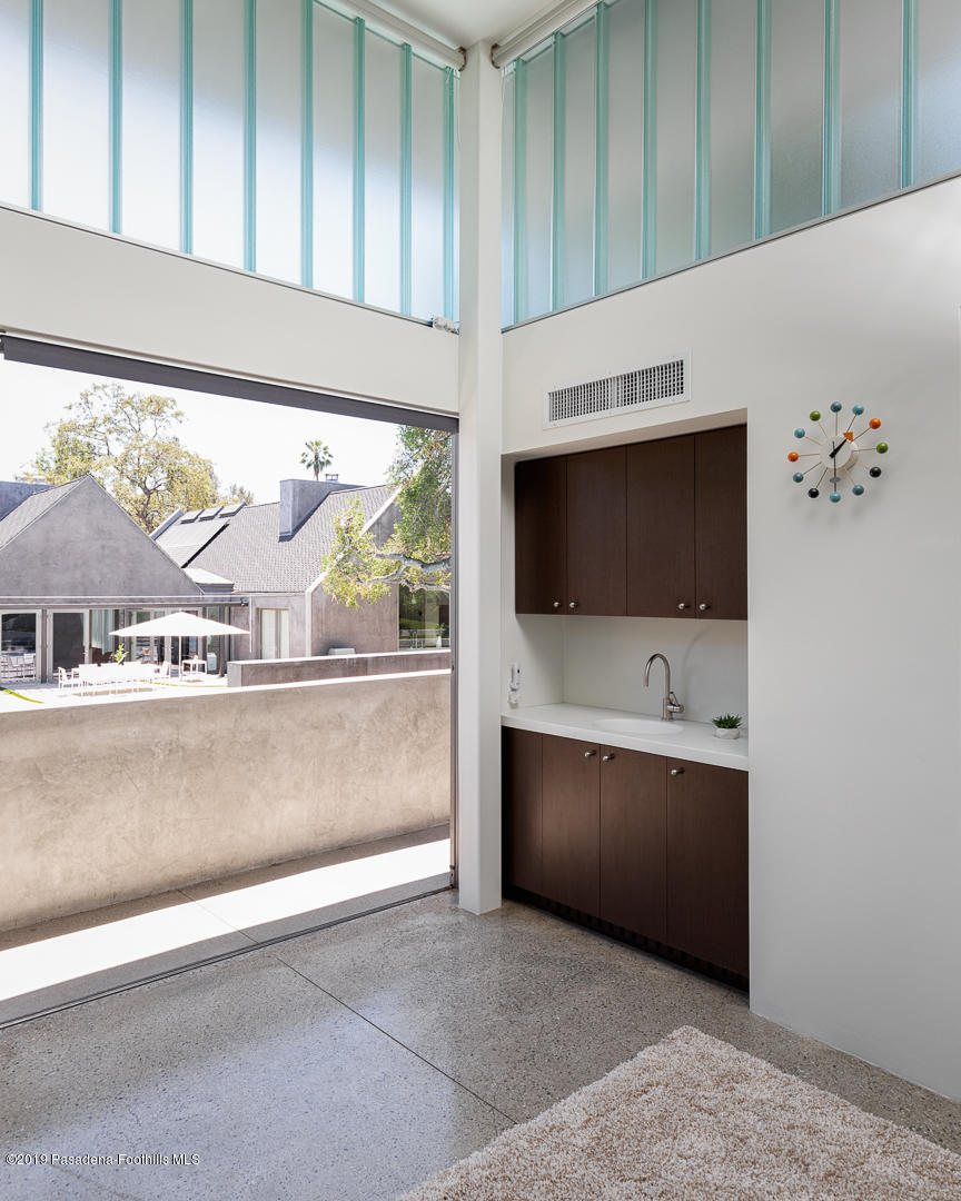 561 Woodland Road Pasadena, CA 91106 - Photo 32 of 41 a view of cabinets with sink