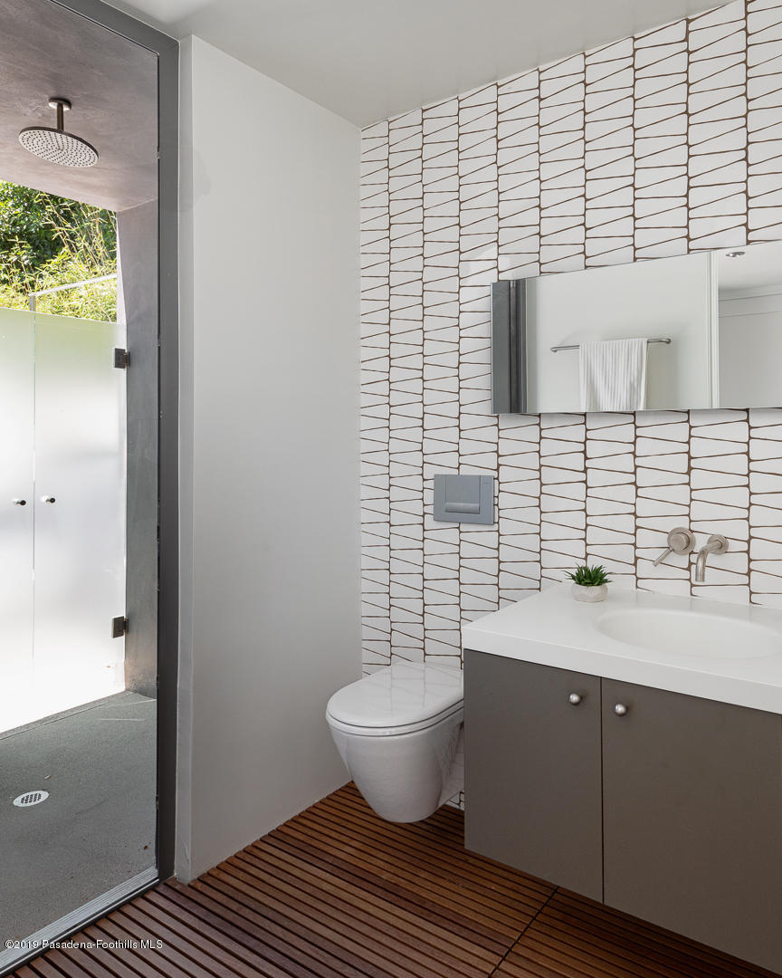 561 Woodland Road Pasadena, CA 91106 - Photo 33 of 41 a bathroom with a sink and a toilet