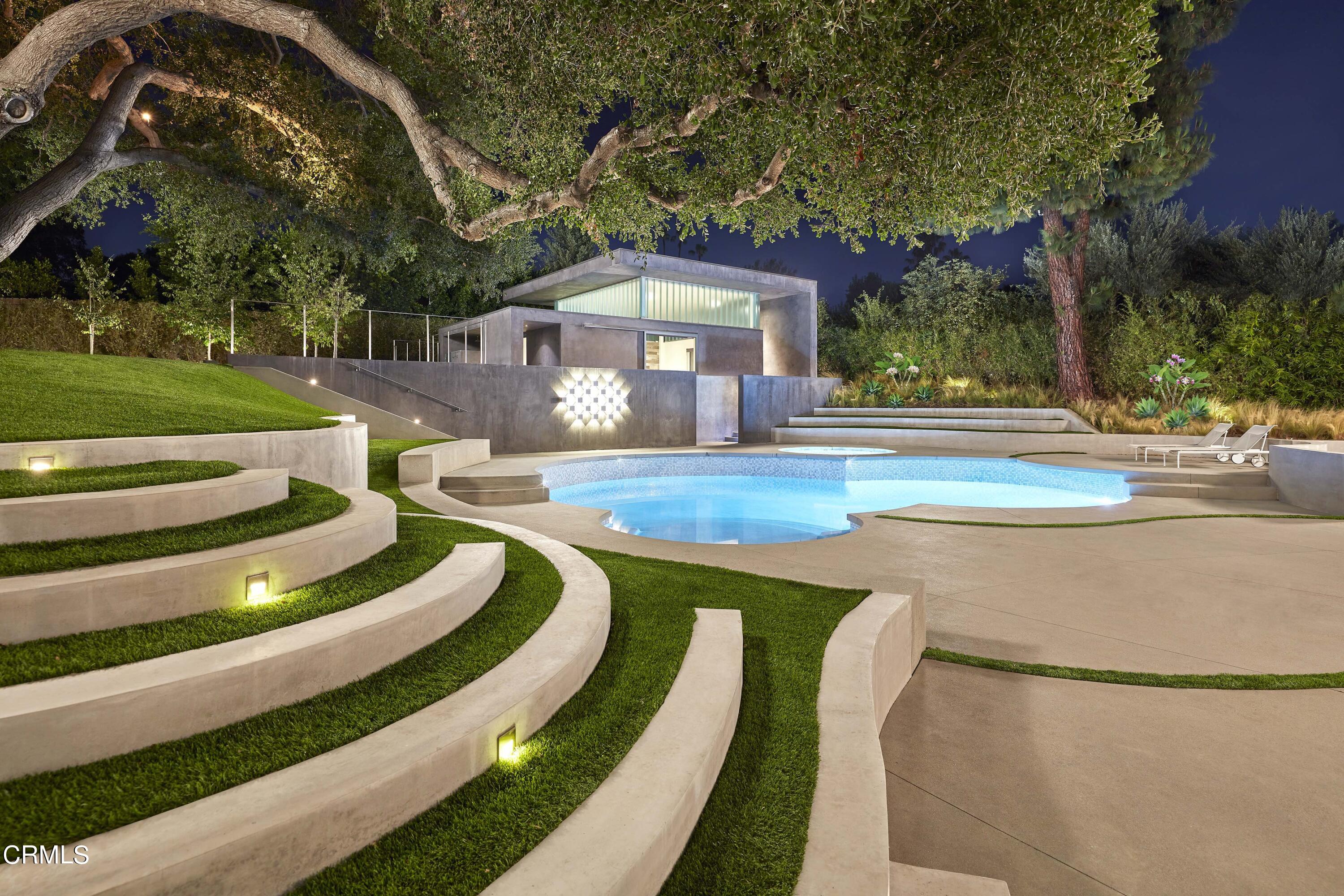 561 Woodland Road Pasadena, CA 91106 - Photo 37 of 41 a view of a house with a swimming pool