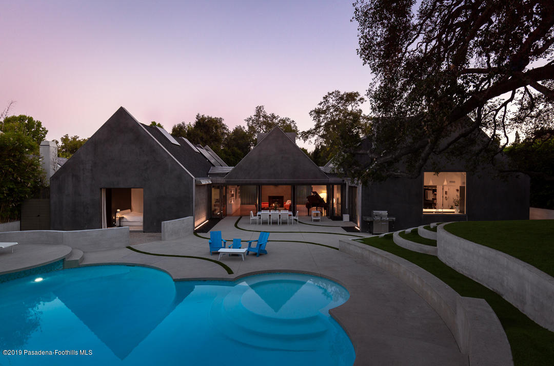 561 Woodland Road Pasadena, CA 91106 - Photo 38 of 41 a house view with a sitting space fire pit and outdoor space