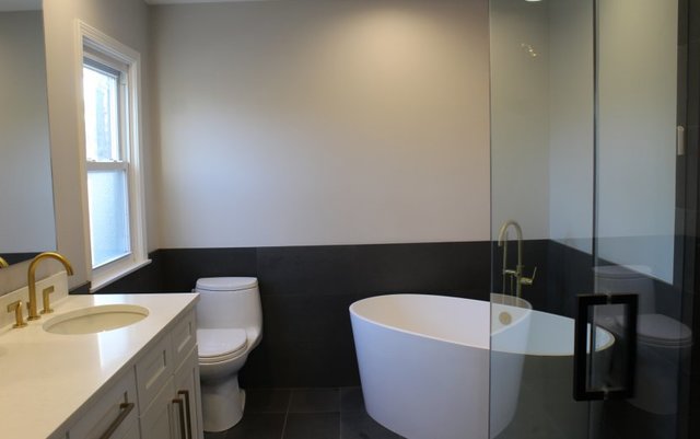 1720 Ridgewood Lane East Glenview, IL 60025 - Photo 14 of 24 a bathroom with a sink and a toilet
