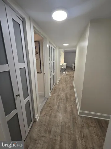 a view of a hallway view with staircase