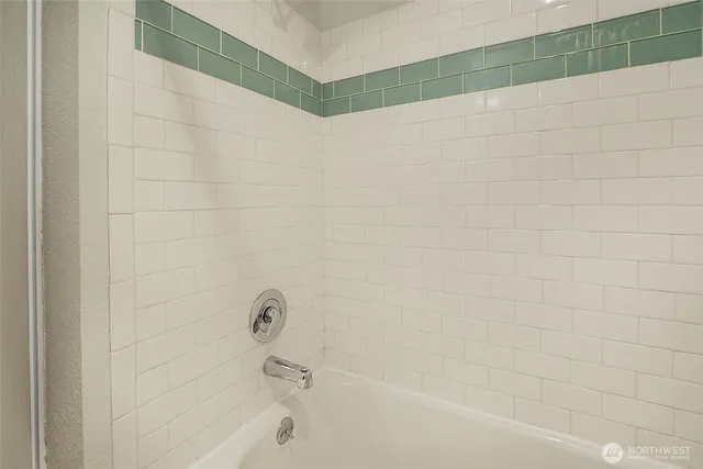 a bathroom with a bathtub