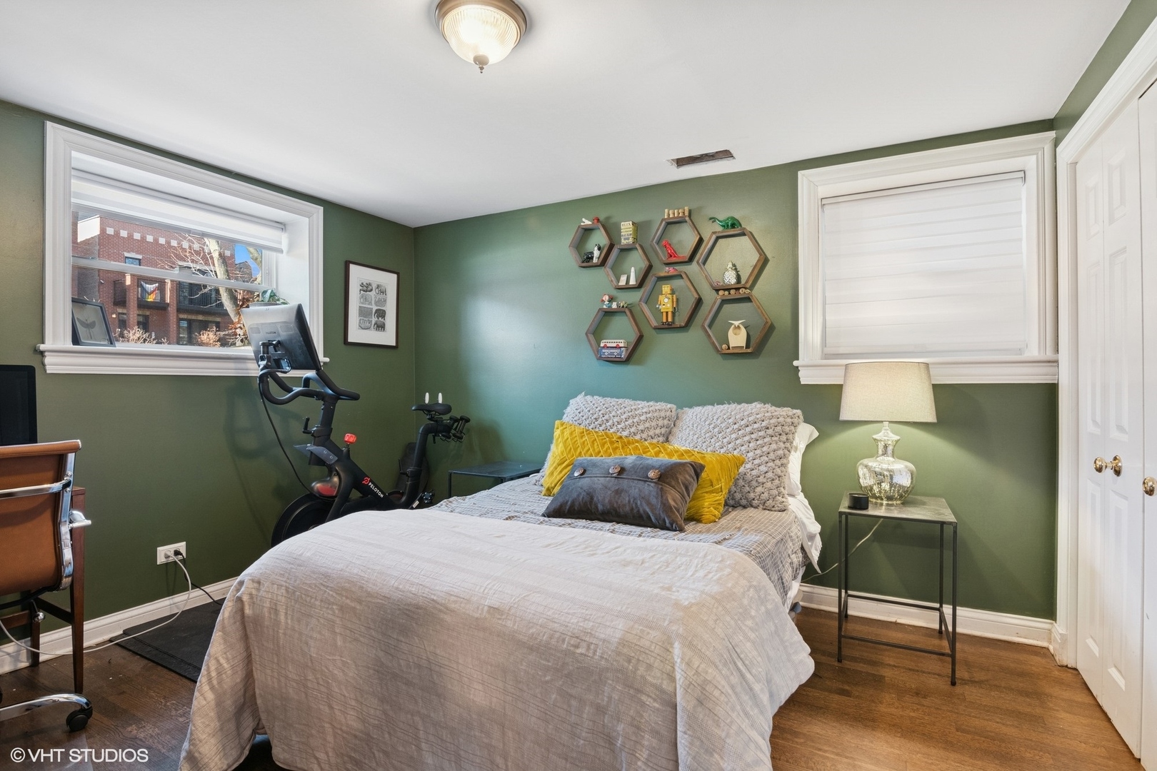 1650 West Rascher Avenue, Unit 1W Chicago, IL 60640 - Photo 12 of 19 a bedroom with a bed and wooden floor