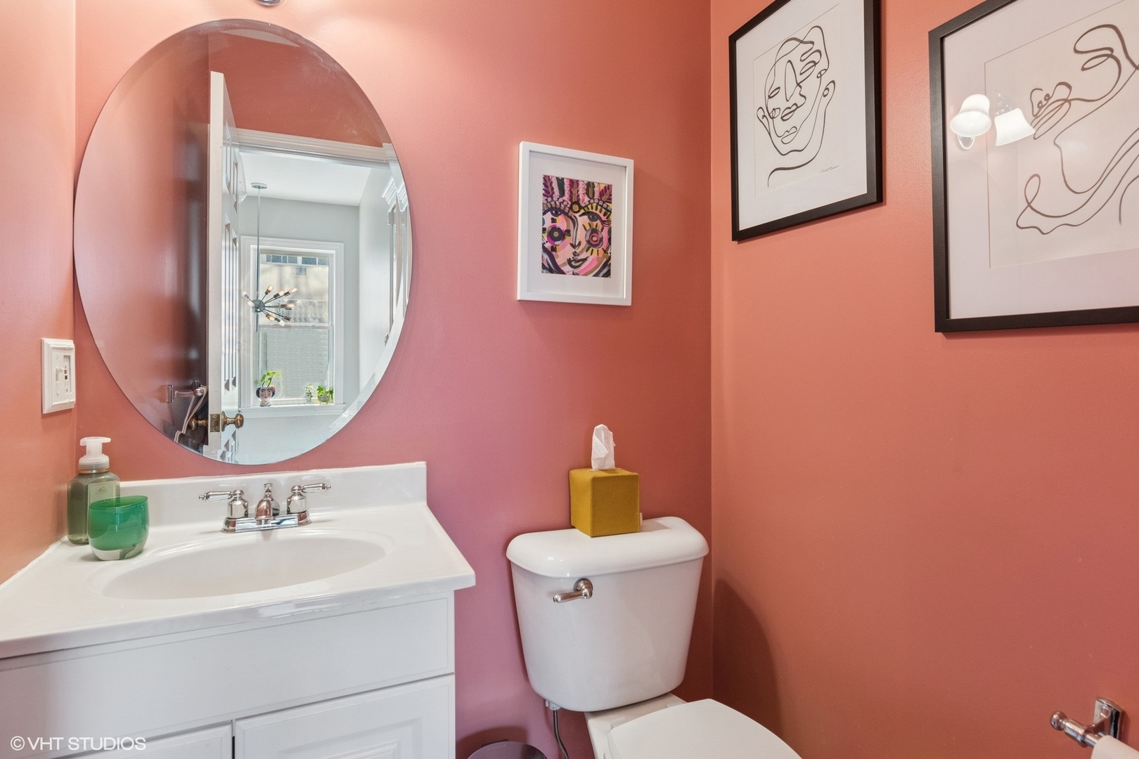 1650 West Rascher Avenue, Unit 1W Chicago, IL 60640 - Photo 15 of 19 a bathroom with a toilet a sink and a mirror