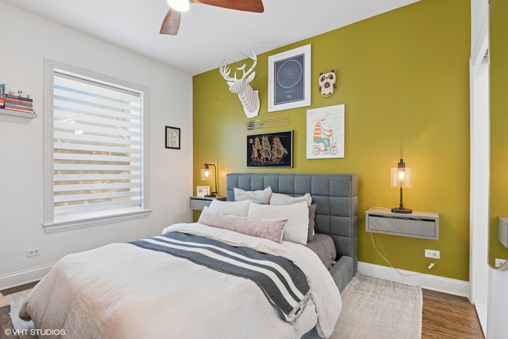 1650 West Rascher Avenue, Unit 1W Chicago, IL 60640 - Photo 6 of 19 a bedroom with a bed and a couch