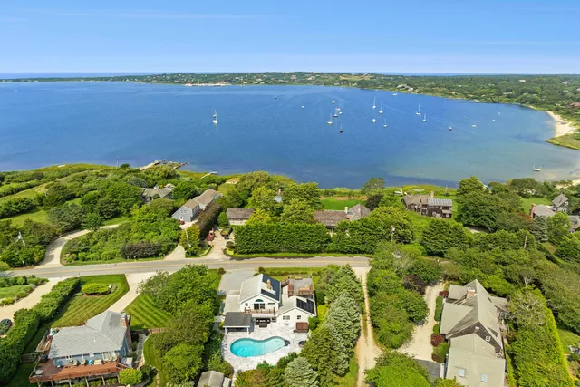 a view of a lake with a house
