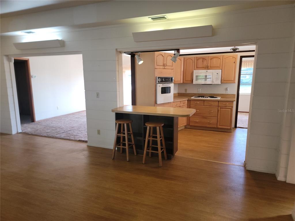 259 Gardenia Road Venice, FL 34293 - Photo 5 of 6 a dining room with furniture and window