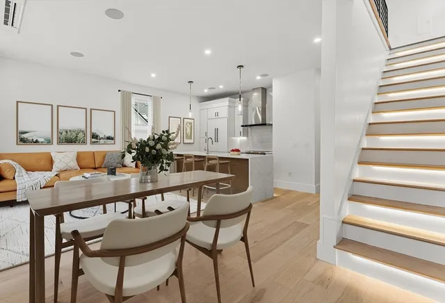 a view of kitchen with wooden floor and kitchen view