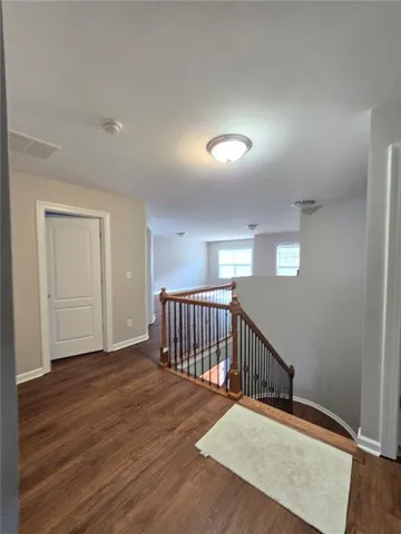 a view of entryway with wooden floor