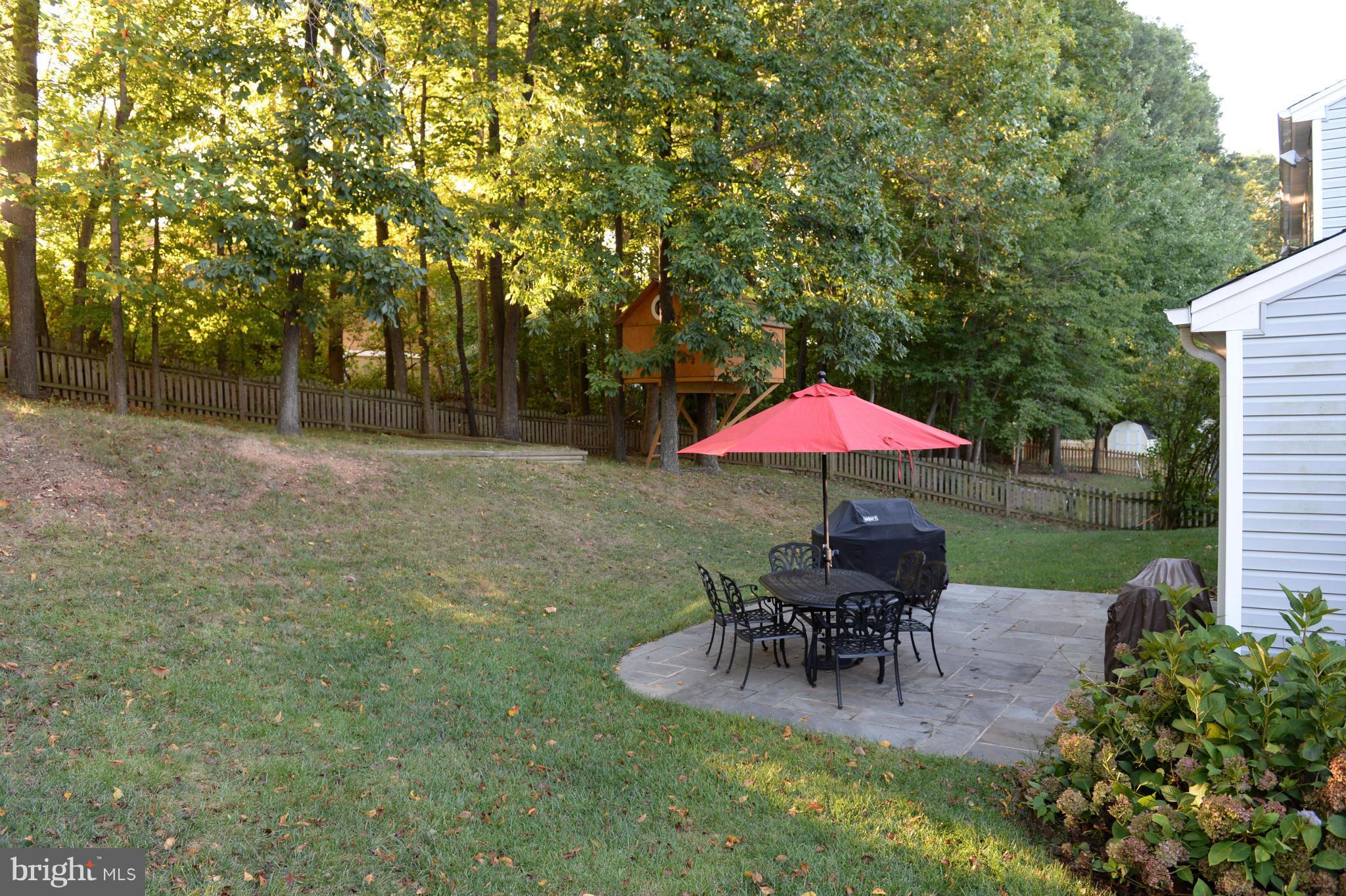 7615 Trail Run Road Falls Church, VA 22042 - Photo 22 of 28 Flagstone patio on treed lot.