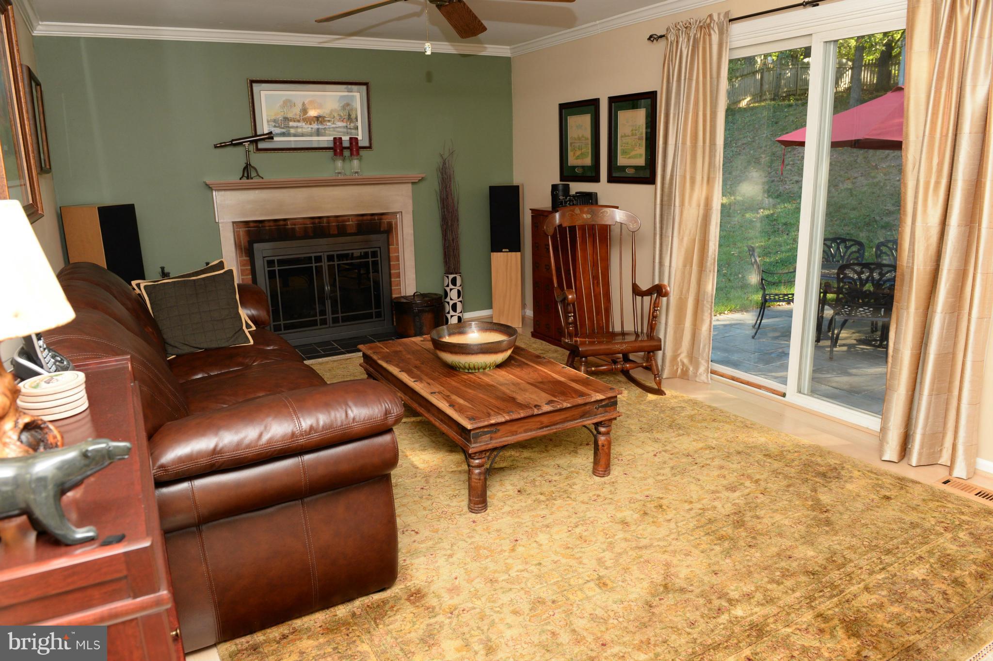 7615 Trail Run Road Falls Church, VA 22042 - Photo 8 of 28 Family Room w/fireplace & SGD to patio