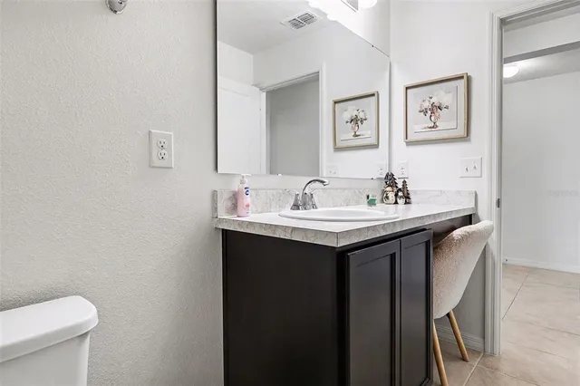 a bathroom with a sink and a toilet