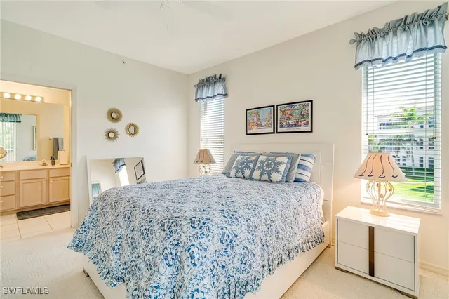 a bedroom with a bed and a cabinets