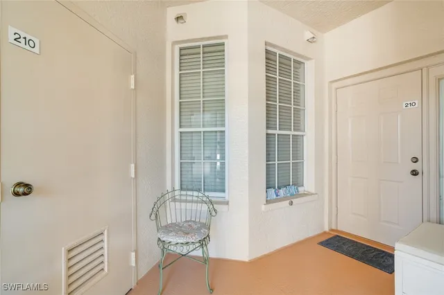 a view of wooden room and windows