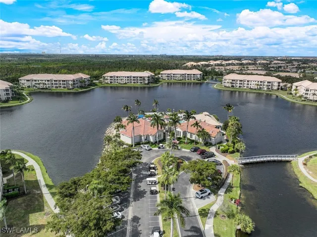 an aerial view of a houses with outdoor space