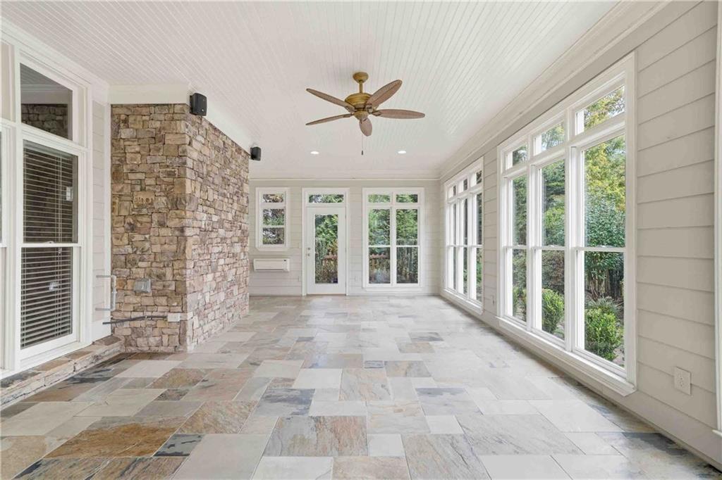 4055 Hill House Road Southwest Smyrna, GA 30082 - Photo 16 of 50 a view of a livingroom with a ceiling fan and window
