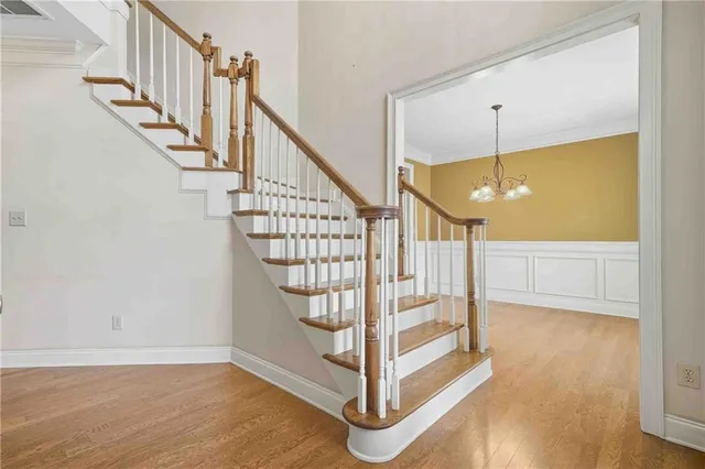 a view of entryway with wooden floor