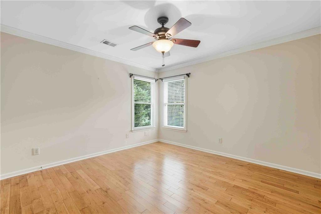 4055 Hill House Road Southwest Smyrna, GA 30082 - Photo 29 of 50 wooden floor in an empty room with a window