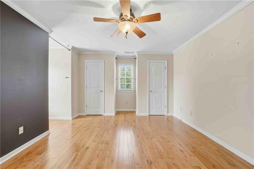 4055 Hill House Road Southwest Smyrna, GA 30082 - Photo 32 of 50 wooden floor in an empty room with a window