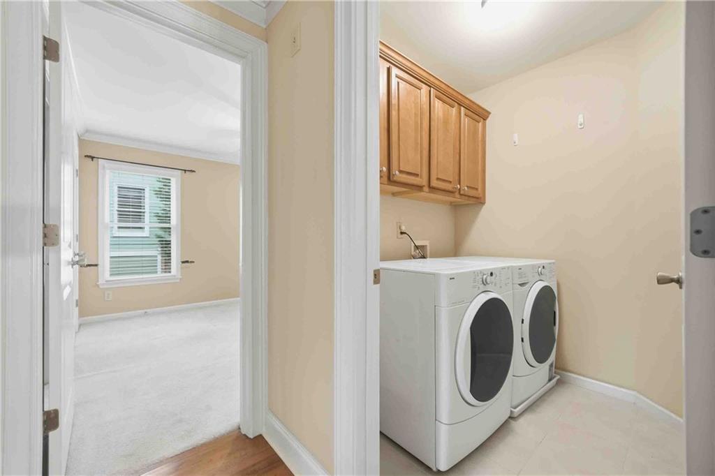 4055 Hill House Road Southwest Smyrna, GA 30082 - Photo 38 of 50 a utility room with dryer and washer