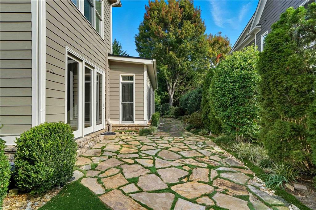 4055 Hill House Road Southwest Smyrna, GA 30082 - Photo 39 of 50 a view of a backyard with plants and large tree