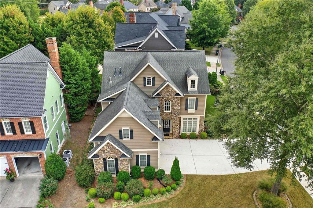 4055 Hill House Road Southwest Smyrna, GA 30082 - Photo 43 of 50 an aerial view of a house with a yard and potted plants